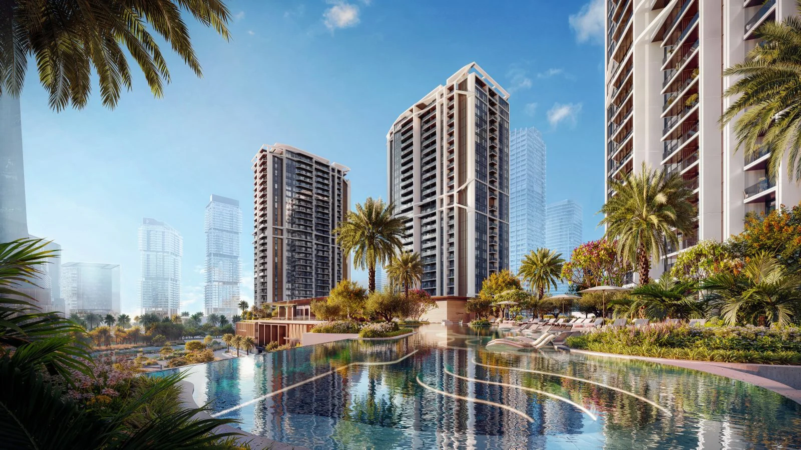 Eltiera Views — pool surrounded by greenery at the foot of the towers