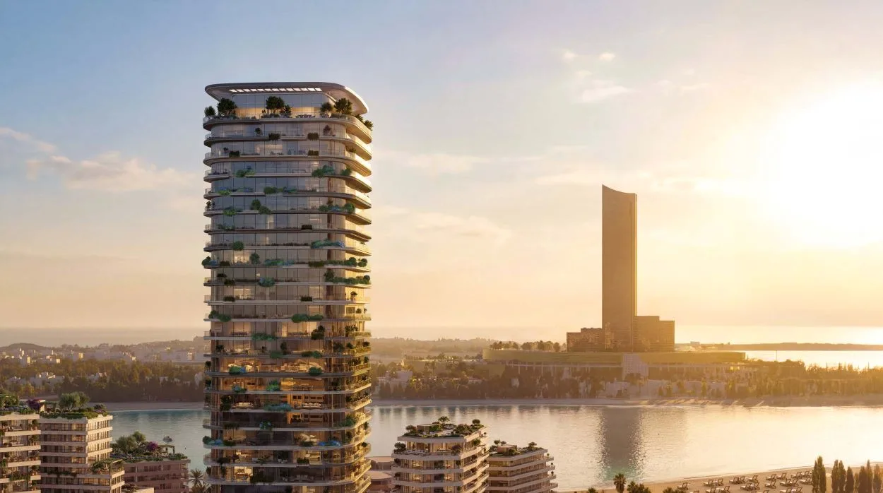 Le Château by Beyond — residential tower at sunset with sea view