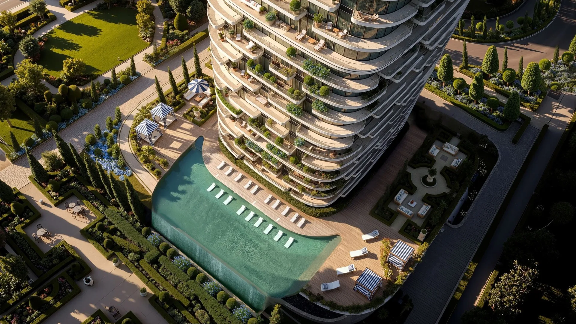Le Château by Beyond — aerial view of pool and landscaped gardens